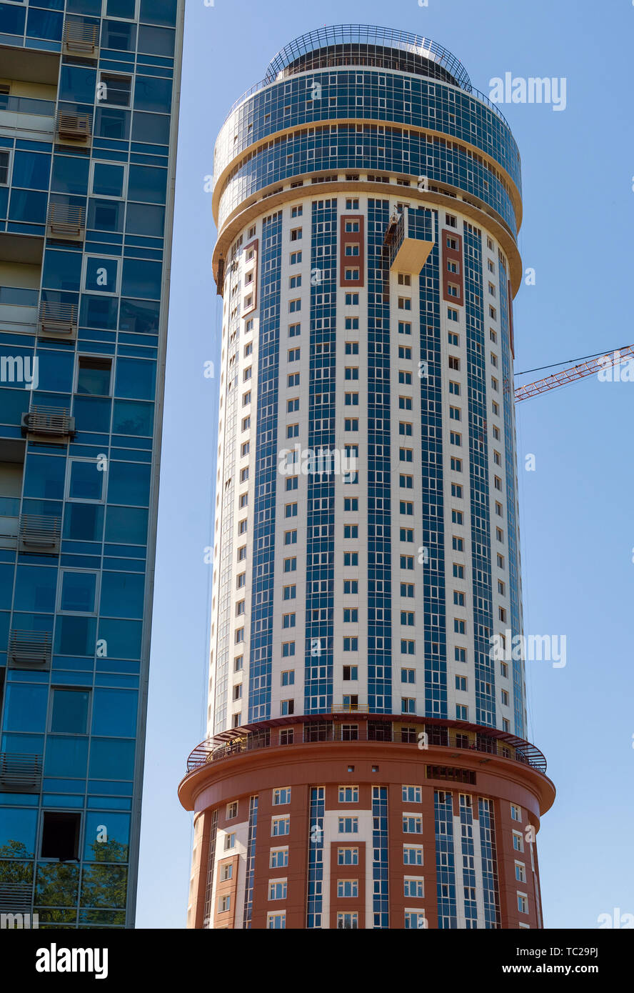 khimki-russia-june-3-2019-mayak-residential-complex-under-construction-in-form-of-a-lighthouse...jpg